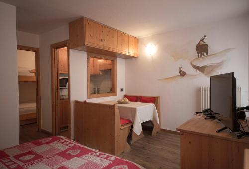 Kuchyň nebo kuchyňský kout v ubytování Residence Miramonti