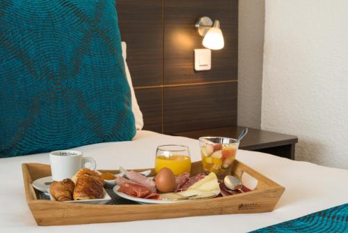 
Breakfast options available to guests at Sure Hotel by Best Western Biarritz Aeroport
