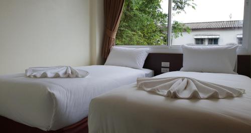 Postel nebo postele na pokoji v ubytování Top Hostel Samui