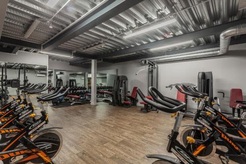 a gym with a bunch of bikes in a room at Radisson Blu Hotel, Cork in Cork