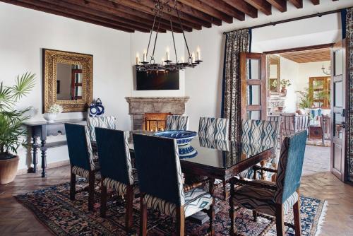 
a living room filled with furniture and a table at Casa de Sierra Nevada, A Belmond Hotel, San Miguel de Allende in San Miguel de Allende
