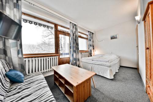 Postel nebo postele na pokoji v ubytování Panorama Gór w Karpaczu