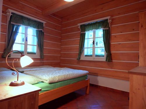Postel nebo postele na pokoji v ubytování Kajzrovka