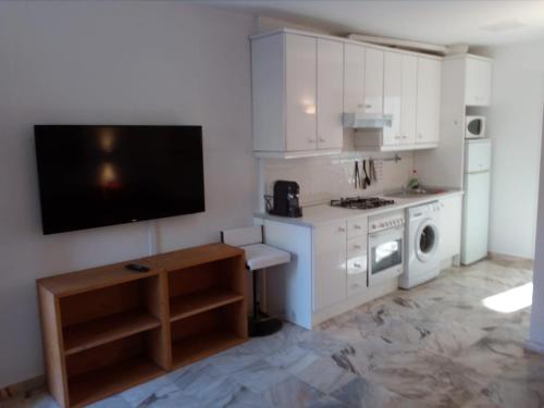 Kuchyň nebo kuchyňský kout v ubytování Casa Sevilla