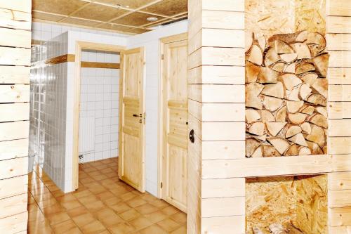 a hallway with a stone wall in a house at City Backpackers Hostel in Stockholm
