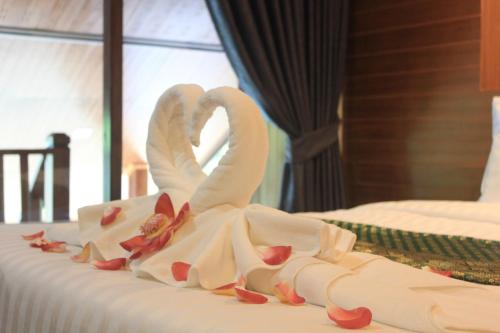 Postel nebo postele na pokoji v ubytování Krabi Klong Muang Bay Resort