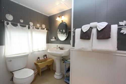 a bathroom with a toilet and a sink at Seagull Inn Bed & Breakfast in Mendocino