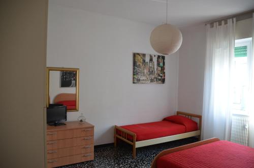 Кровать или кровати в номере A Due Passi Dal Mare
