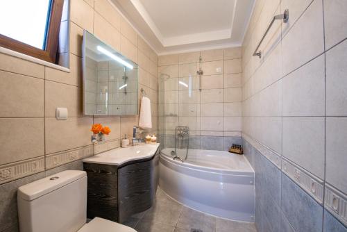Ένα μπάνιο στο Casa Leone Suites