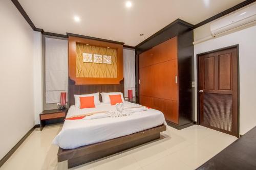 Ein Bett oder Betten in einem Zimmer der Unterkunft Anda Lamoon Villa Krabi
