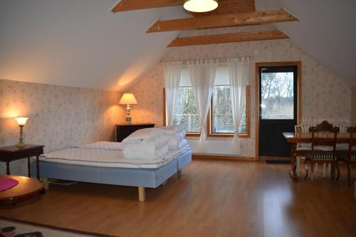 Ένα ή περισσότερα κρεβάτια σε δωμάτιο στο Åsa Jutegård