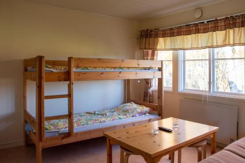 Ένα ή περισσότερα κρεβάτια σε δωμάτιο στο Älvdalens Camping