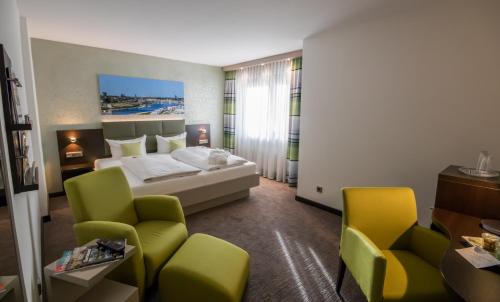 Una cama o camas en una habitación de Ringhotel Drees