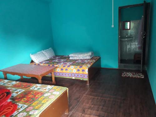 Vamoose Bhutia Homestayにあるベッド