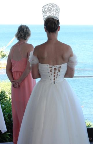a bride is looking out at the ocean at Hotel Boutique Milla de Plata in Torreguadiaro