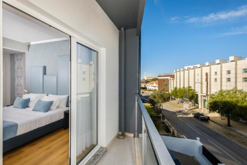 Postel nebo postele na pokoji v ubytování Hotel Rosa Mística by Umbral