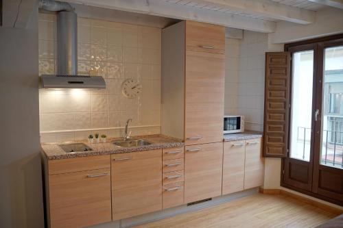 Kuchyň nebo kuchyňský kout v ubytování Úbeda Suites