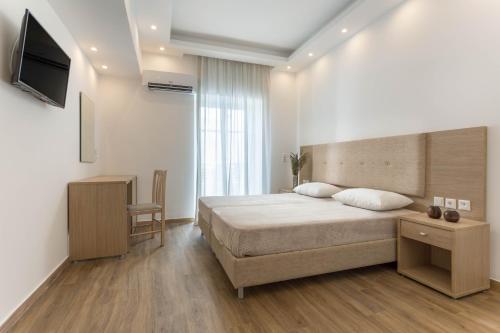 Postel nebo postele na pokoji v ubytování Mare Naxia Hotel