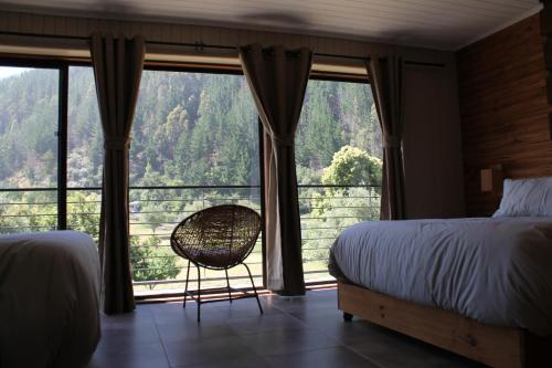 BancoArena Hotel - Refugio Riberaにあるベッド