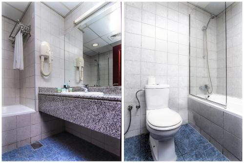 Ένα μπάνιο στο Parkside Hotel Apartment