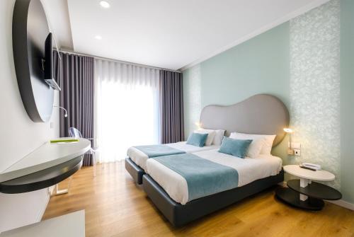 Hotel Rosa Mística by Umbralにあるベッド