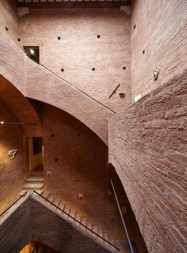 a view of a staircase in a building at Palazzetto Rosso - Art Hotel in Siena