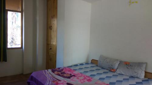 Sunface Homestayにあるベッド