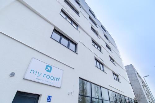 a sign on the side of a building at Apart Hotel Messe Munich - my room Apartments in Munich
