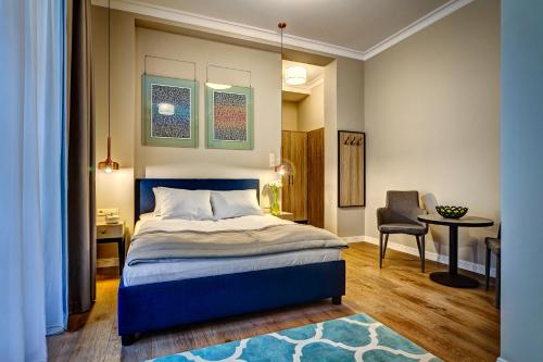 Ένα ή περισσότερα κρεβάτια σε δωμάτιο στο Joyinn Aparthotel