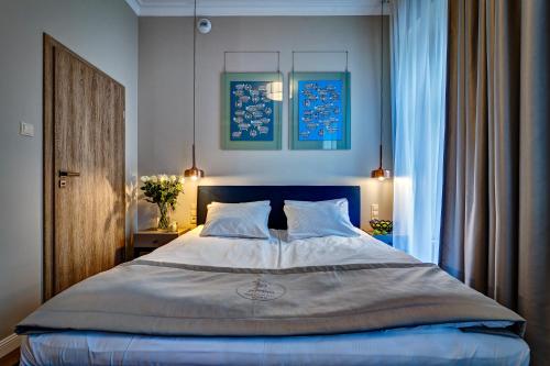 Ένα ή περισσότερα κρεβάτια σε δωμάτιο στο Joyinn Aparthotel