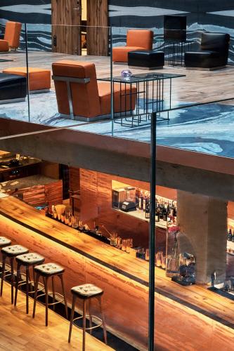 a view of a stage with chairs and tables at Hotel Warszawa in Warsaw