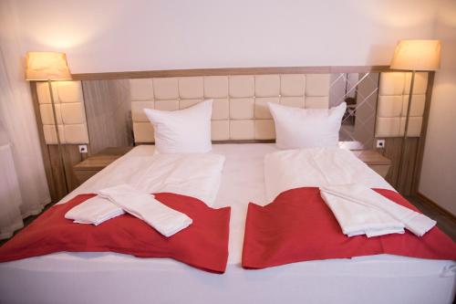 Ένα ή περισσότερα κρεβάτια σε δωμάτιο στο Hotel Hausen Obertshausen Frankfurt