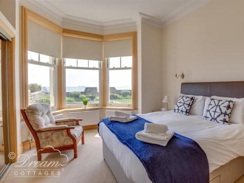 Ένα ή περισσότερα κρεβάτια σε δωμάτιο στο Beach View Apartment 2