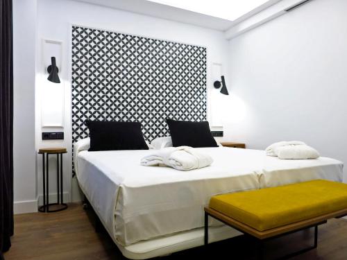 
Cama o camas de una habitación en Hotel Colón Plaza

