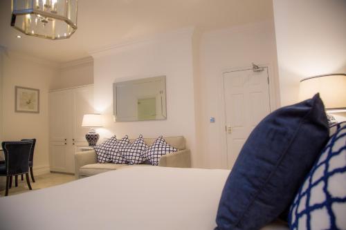 a bedroom with a bed and a living room at Winckley Stays in Preston