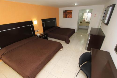 Postel nebo postele na pokoji v ubytování Hotel 5 inn