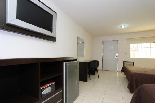 Kuchyň nebo kuchyňský kout v ubytování Hotel 5 inn