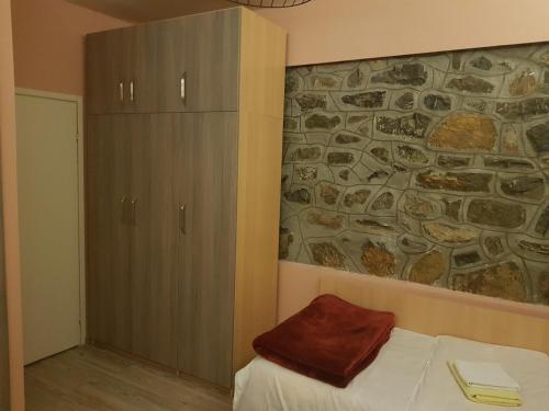 Una cama o camas en una habitación de Apartment Center