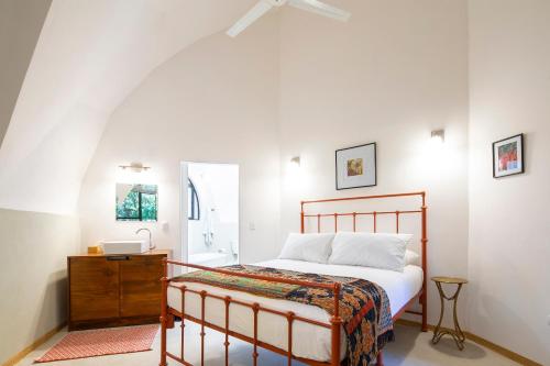 Un pat sau paturi într-o cameră la Villa San Ignacio