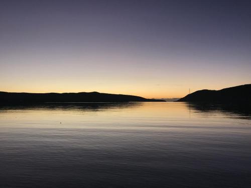 a view of a large body of water at sunset at Parador Guánica 1929 in Guanica