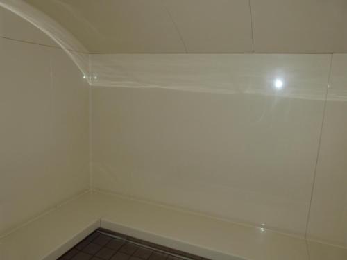 a corner of a room with a white wall at Residence Panorama in Villars-sur-Ollon