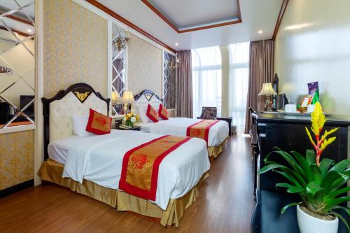 Giường trong phòng chung tại Phuong Anh Hotel