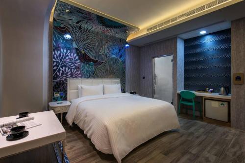Una cama o camas en una habitación de Point Motel