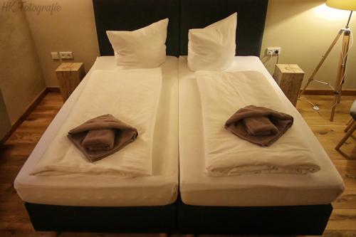 Letto o letti in una camera di Hostel & Hotel Fairista