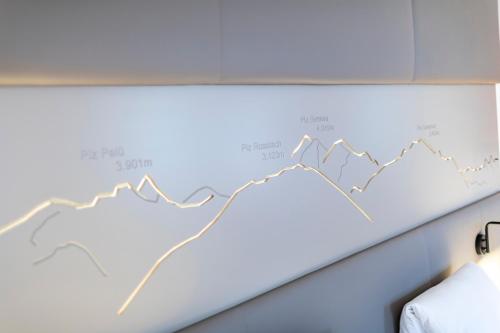 a chart on a wall in a hospital room at Hotel Rosatsch in Pontresina