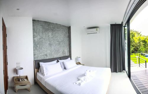 Scenery Samuiにあるベッド