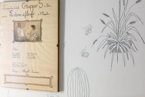 a page of a book with a drawing of a plant at Hotel Pocho in San Vito lo Capo