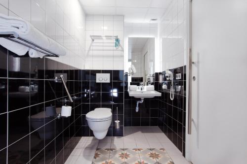 Koupelna v ubytování Hotel Albert 1er