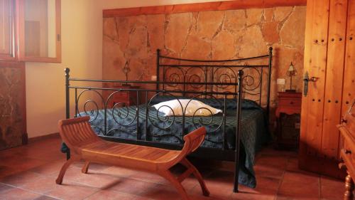 מיטה או מיטות בחדר ב-Casa Rural El Lirón