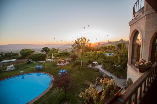 an aerial view of a resort with a swimming pool at Karlık Evi Hotel - Special Category in Uchisar